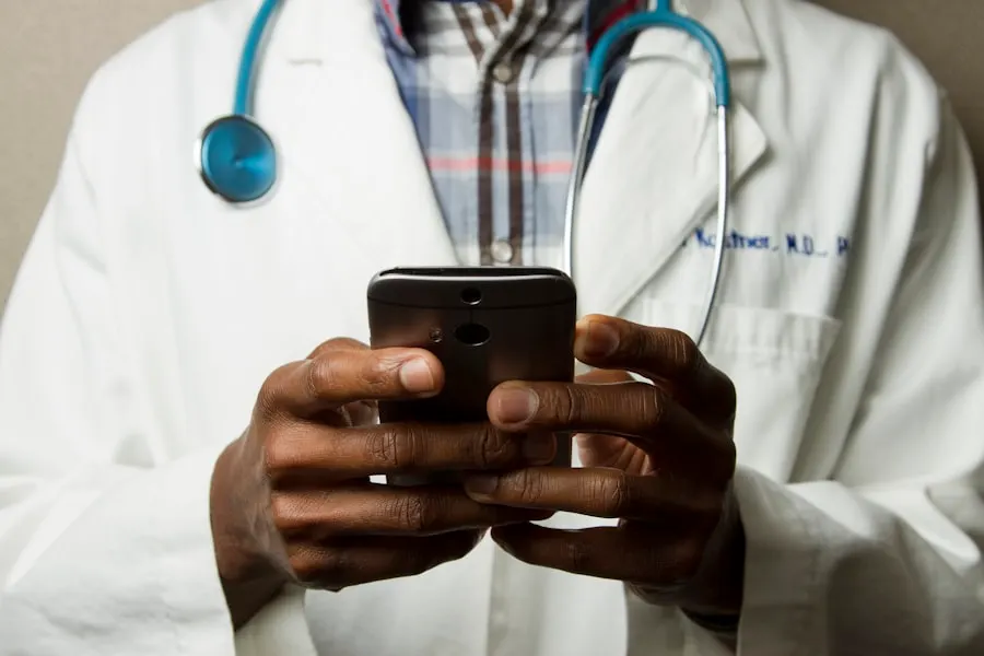 Clinician reviewing a chart in a clinical setting